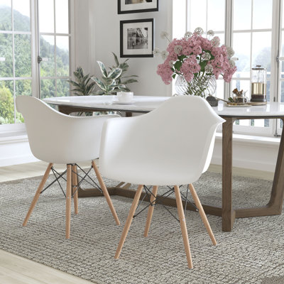 White plastic chair with wooden legs hotsell
